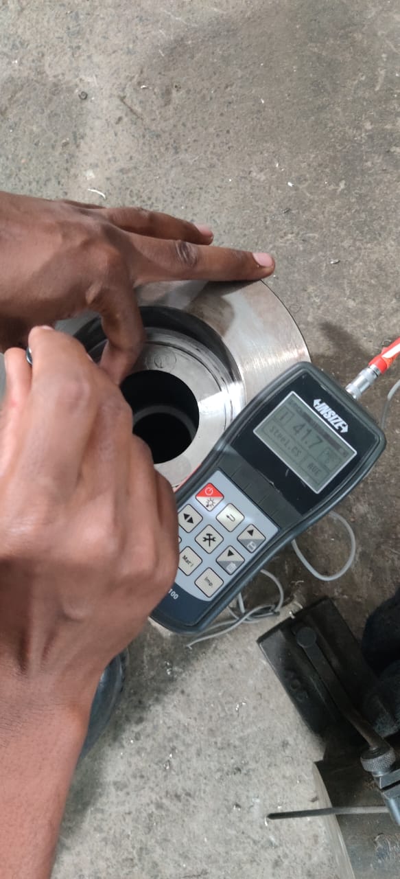 Portable hardness tester reading 41.7 HRC