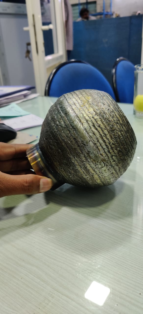 Spherical valve ball with weld buildup cladding